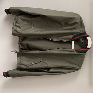 Green jacket with red details
